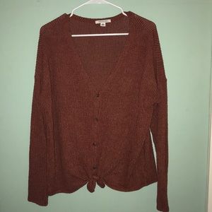 Light v-neck sweater with front tie